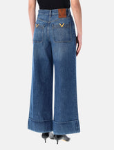 Valentino Garavani wide-leg denim trousers - | Spazio Pritelli