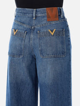Valentino Garavani wide-leg denim trousers - | Spazio Pritelli