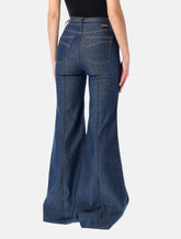 Jeans a zampa in denim di Zimmermann - | Spazio Pritelli