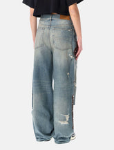 Amiri Bones wide-leg studded jeans - | Spazio Pritelli