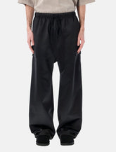Fear of God Essentials bonded satin pants black - | Spazio Pritelli