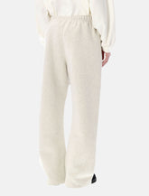 Fear of God Essentials Flare sweatpants oatmeal heather - | Spazio Pritelli