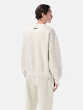Fear of God Essentials Embossed crewneck oatmeal heather - | Spazio Pritelli
