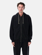 Felpa oversize con cappuccio e zip di Champion - | Spazio Pritelli
