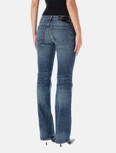 Khaite Conforti low-rise flare jeans - | Spazio Pritelli