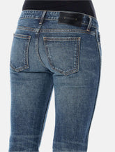 Khaite Conforti low-rise flare jeans - | Spazio Pritelli