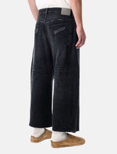 Balenciaga curved-leg denim jeans - | Spazio Pritelli