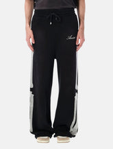 Amiri Bones oversized cotton sweatpants - | Spazio Pritelli