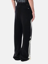 Amiri Bones oversized cotton sweatpants - | Spazio Pritelli