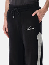 Amiri Bones oversized cotton sweatpants - | Spazio Pritelli