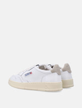 Autry Medalist low leather sneakers in white and feather grey - | Spazio Pritelli