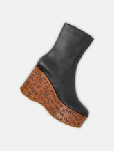 Chloé Maxime leather wedge ankle boots - | Spazio Pritelli