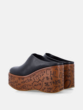 Chloé Maxime leather wedge mules - | Spazio Pritelli