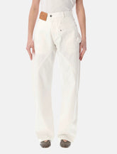 JW Anderson twisted denim jeans - | Spazio Pritelli