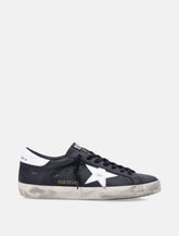 Golden Goose Super-Star black leather sneakers with white star - | Spazio Pritelli