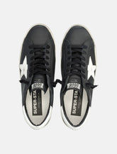 Golden Goose Super-Star black leather sneakers with white star - | Spazio Pritelli