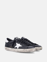Golden Goose Super-Star black leather sneakers with white star - | Spazio Pritelli