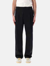 Golden Goose black loose-fit pleated trousers - | Spazio Pritelli