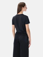 Top Dri-FIT a manica corta con nodo di Nike - | Spazio Pritelli