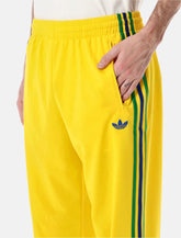 Adidas Originals yellow Firebird track pants - | Spazio Pritelli