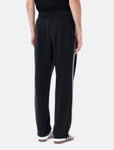 Adidas Originals Firebird black track pants - | Spazio Pritelli