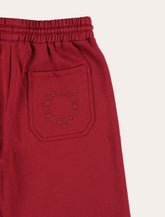 Stella McCartney Kids red joggers - | Spazio Pritelli