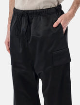 Pantaloni Field in satin Fear of God Essentials neri -  | Spazio Pritelli