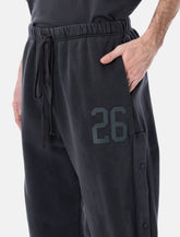 Pantaloni Fear of God Essentials Tearaway -  | Spazio Pritelli