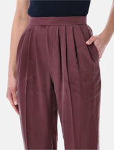 Saint Laurent mid-rise silk Habotai pants -  | Spazio Pritelli