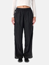 Pantaloni sportivi T7 neri di PUMA x ROSÉ -  | Spazio Pritelli