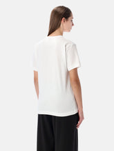 T-shirt bianca con cuore e cristalli di Comme des Garçons Play -  | Spazio Pritelli