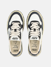 Autry x Maison Mihara Yasuhiro Medalist Low Super Vintage white and black leather woman's sneakers -  | Spazio Pritelli