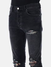 Amiri black Crane MX1 skinny jeans -  | Spazio Pritelli