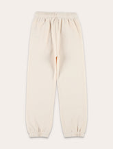 Jogging crema con logo di Sporty & Rich Kids -  | Spazio Pritelli