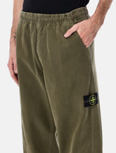 Pantaloni jogger Stone Island in cotone Panama biologico effetto “Old” -  | Spazio Pritelli