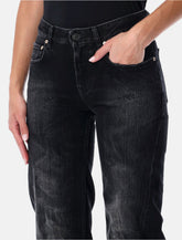 Balenciaga wide-leg washed black denim jeans -  | Spazio Pritelli