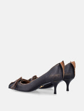 Prada distressed leather bow pumps -  | Spazio Pritelli