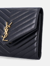 Saint Laurent Cassandre Matelassé Flap Pouch in quilted lambskin -  | Spazio Pritelli