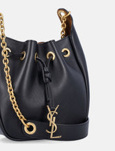 Saint Laurent black leather supple bucket bag with chain -  | Spazio Pritelli