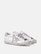 Sneakers Golden Goose Super-Star in pelle bianca e argento da donna -  | Spazio Pritelli