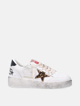 Sneakers da donna Golden Goose Ball Star in pelle bianca con stella animalier -  | Spazio Pritelli