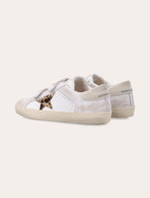 Sneakers Old School da bambina in pelle con stella in pony animalier Golden Goose -  | Spazio Pritelli