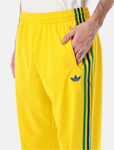 Adidas Originals yellow Firebird track pants -  | Spazio Pritelli