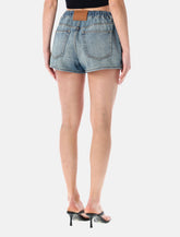 Shorts in denim con coulisse gioiello di Alexander Wang -  | Spazio Pritelli