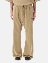 Essentials Fear of God Training Classic Flare beige sweatpants -  | Spazio Pritelli
