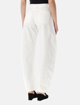 Alaïa low waist curved jeans -  | Spazio Pritelli