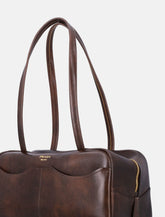 Prada Carry large antiqued leather top-handle bag -  | Spazio Pritelli