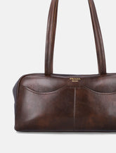 Prada Carry large antiqued leather top-handle bag -  | Spazio Pritelli
