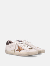 Golden Goose Super-Star woman's sneakers white and bronze -  | Spazio Pritelli