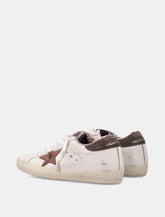 Golden Goose Super-Star woman's sneakers white and bronze -  | Spazio Pritelli
